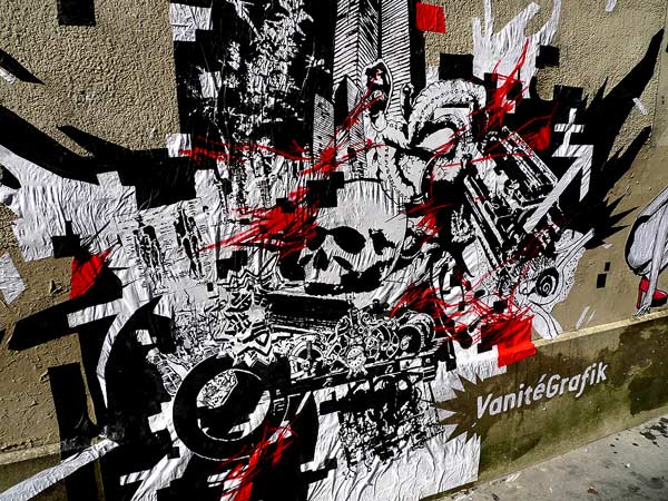 intervention vanite grafik a poster sticked in the street of Paris by alex kanos