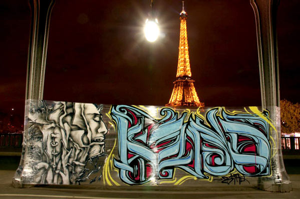 a cellograff painted close to eiffel tower