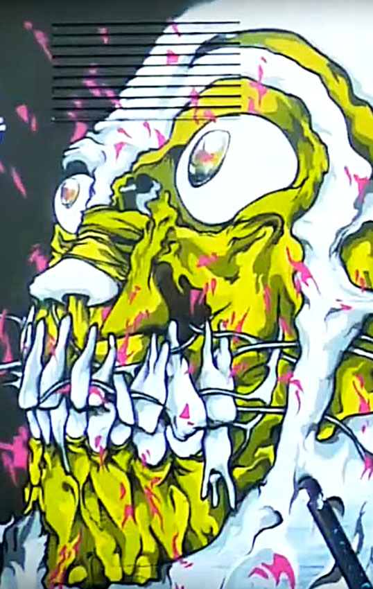 a skull head painted by alex kanos made during odv tour 2010