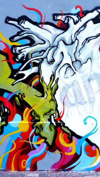 AU CŒUR DE LA VILLE a graffiti with a heart and letters by alex kanos
