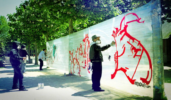kanos painting a cellograff in angers france during artaq awards