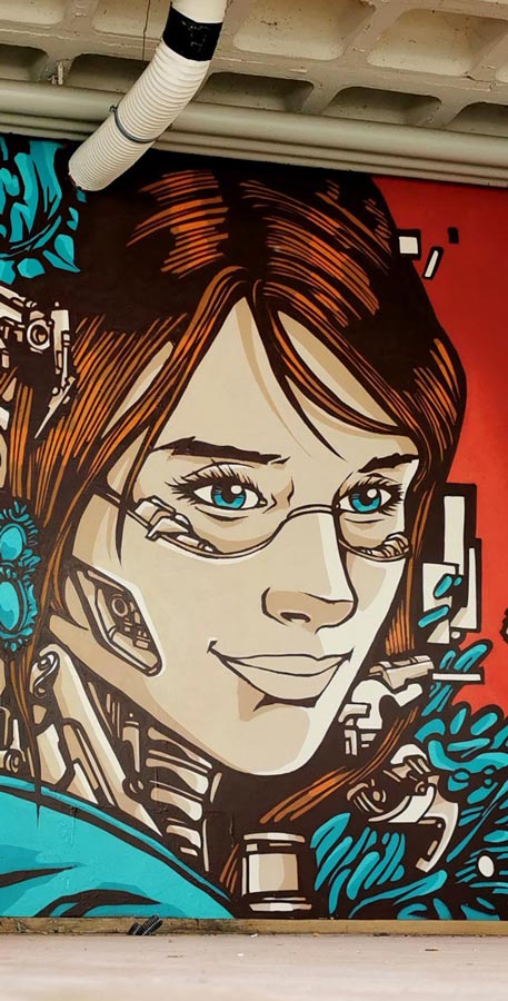 close-up of an idoor mural made by alex kanos called clemence in geneva switzerland