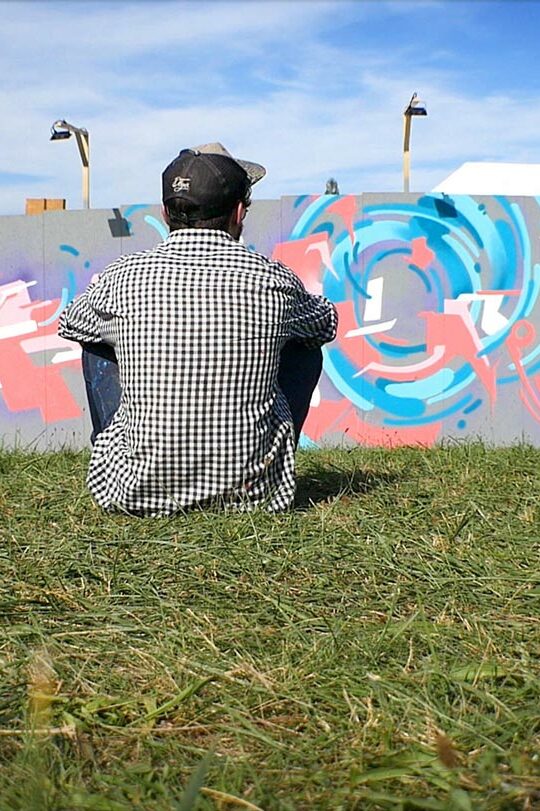 A Graffiti paint by Alex Kanos in Geneva alex kanos is looking to his graffiti made during plein-les-watts festival in geneva