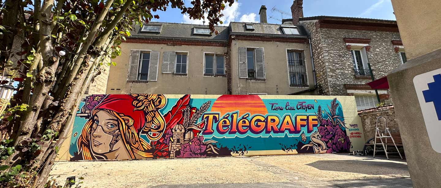 Completed public street art mural in Gonesse, France created by Alex Kanos