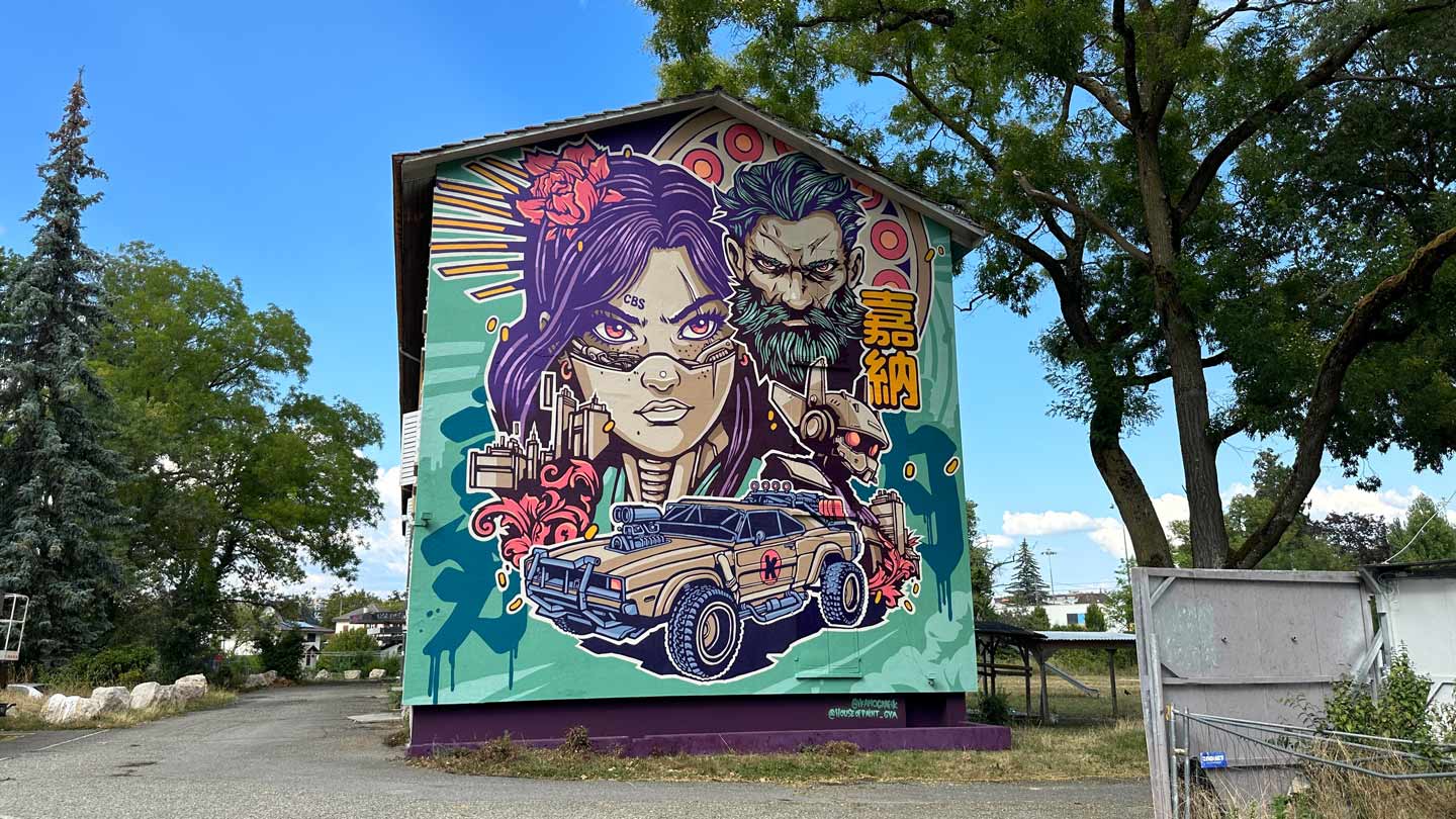 Alex Kanos painting Valkyrie Sequel street art mural during House of Paint Geneva